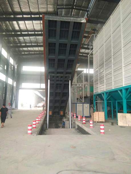 自動液壓翻板卸車機